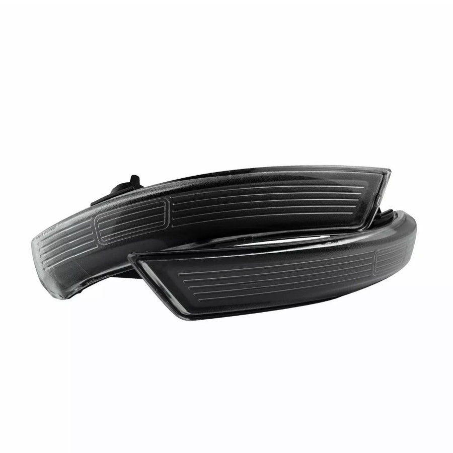 A pair of sleek, black car side mirror indicators with aerodynamic lines, positioned against a plain white background.
