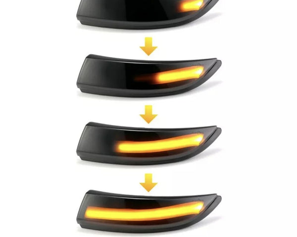 Sequential images of a car turn signal light gradually increasing in illumination from dim to bright, within a streamlined black housing, depicted against a plain white background. Yellow arrows indicate progression.
