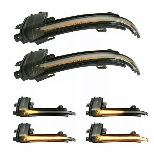 Curved LED car lights are displayed in two rows; the top pair is unlit, while the bottom pair shows illuminated amber signals. The lights are set against a plain white background.