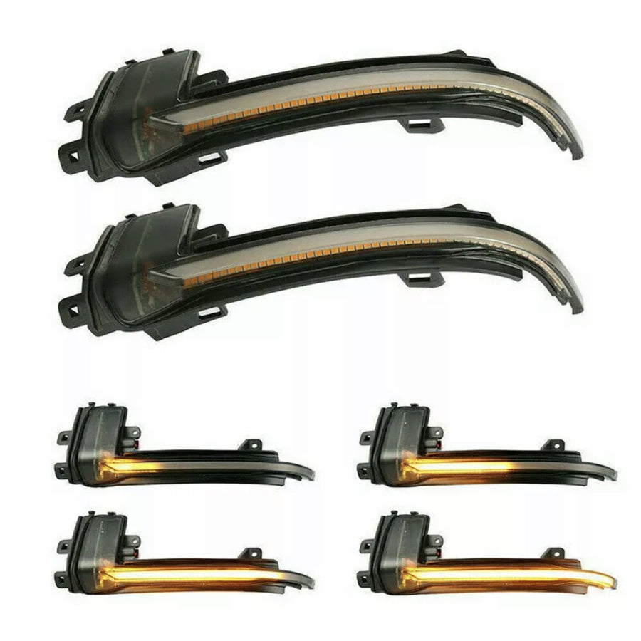 Curved LED car lights are displayed in two rows; the top pair is unlit, while the bottom pair shows illuminated amber signals. The lights are set against a plain white background.