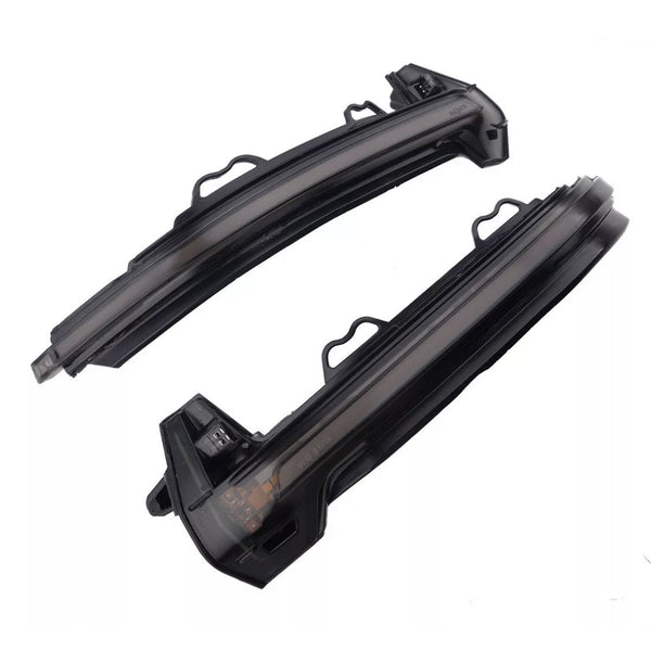 Two curved black LED car indicator lights rest side by side against a white background, featuring integrated connectors and mounting brackets for vehicle installation.