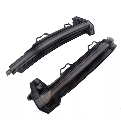 Two curved black LED car indicator lights rest side by side against a white background, featuring integrated connectors and mounting brackets for vehicle installation.