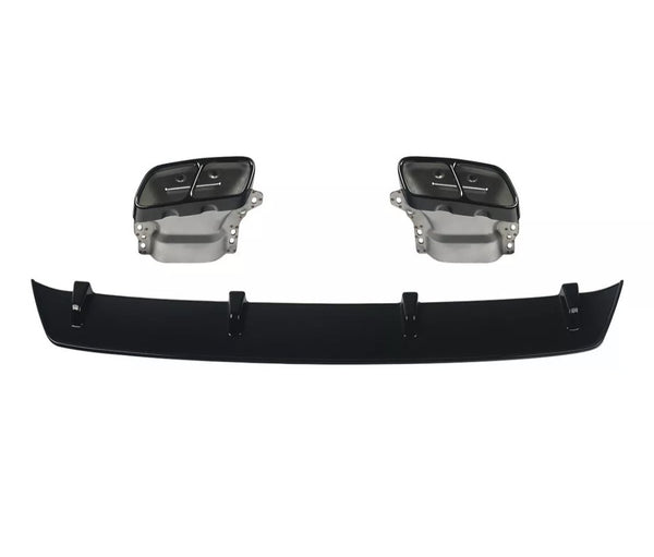 Two rectangular exhaust tips are positioned above a black rear diffuser with vertical fins, isolated against a plain white background.