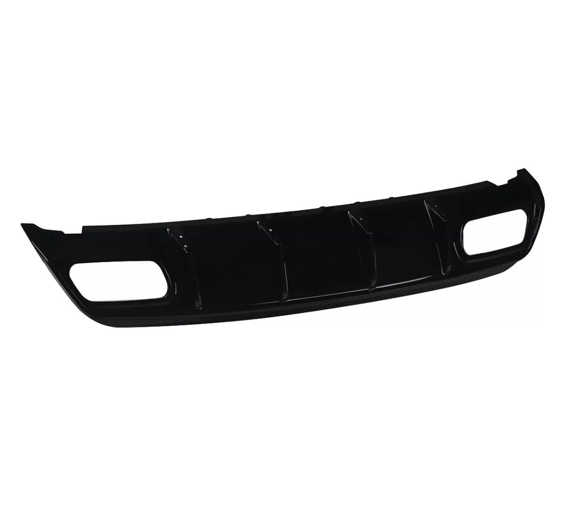 A black car bumper with vent-like openings is displayed against a plain white background. It features a smooth, curved design with two rectangular sections on either side.