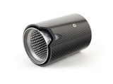 A cylindrical carbon fiber exhaust tip lies on a white background, featuring a perforated metal interior designed for automotive use.