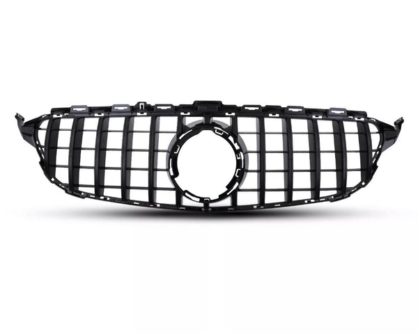 A black car grille with vertical and horizontal slats is positioned against a plain white background, featuring a central circular emblem space, suggesting automotive design.