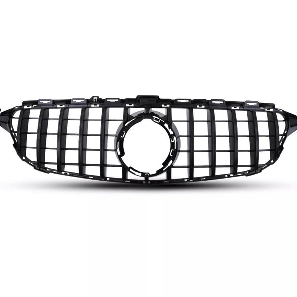 A black car grille with vertical and horizontal slats is positioned against a plain white background, featuring a central circular emblem space, suggesting automotive design.