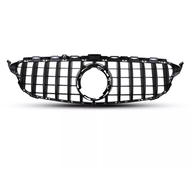 A black car grille with vertical and horizontal slats is positioned against a plain white background, featuring a central circular emblem space, suggesting automotive design.