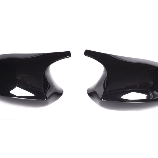 Two glossy black side mirror covers facing each other on a white background, with a sleek, curved design.