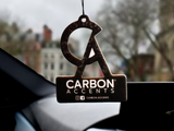 A car air freshener with a stylized 